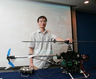 MPhil student Wang Tao and his mini-helicopter	
