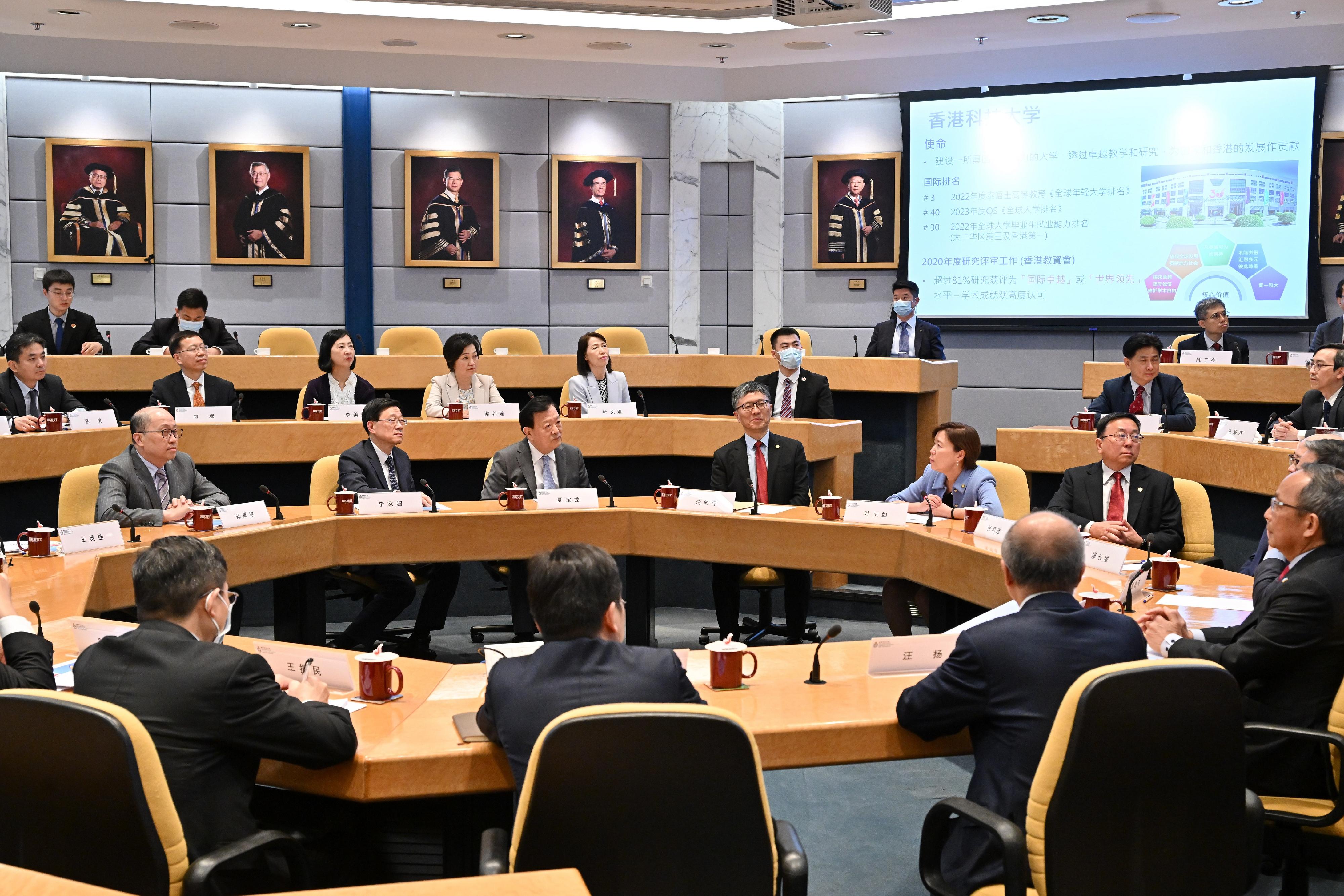 Accompanied by Chief Executive Mr. John LEE and Secretary for Education Dr. CHOI Yuk-lin, Director XIA Baolong was briefed by HKUST Council Chairman Prof. Harry SHUM and President Prof. Nancy IP, on the development strategy of the university.