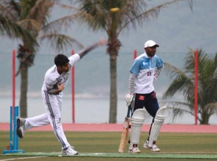  HKUST's Tariq bowling during a match held at the UST ground