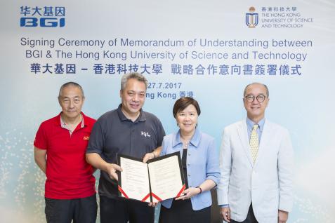  HKUST President Prof Tony F Chan (first right) and BGI Group President and Co-founder Prof Wang Jian (first left) officiate at the ceremony and witness the MoU signing by Prof Nancy Ip, HKUST Vice-President for Research and Graduate Studies (second right) and Mr Duncan Yu, BGI Group Vice President.