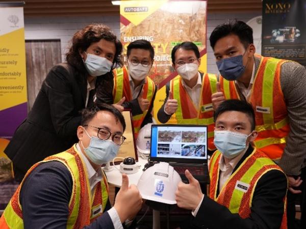 The winning team of the Sino-HKUST One Million Dollar Entrepreneurship Competition founded AutoSafe, an AI solution company leveraging smart technology to modernize and automate worksite safety monitoring while improving efficiency. In the photo: Issac LEUNG, co-founder (first left, back row), Prof. Jack CHENG (second right, back row), and Peter WONG, co-founder (first right, front row).